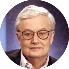 Portrait of a middle-aged man with glasses, showcasing a thoughtful expression against a circular background, often associated with film criticism and commentary.