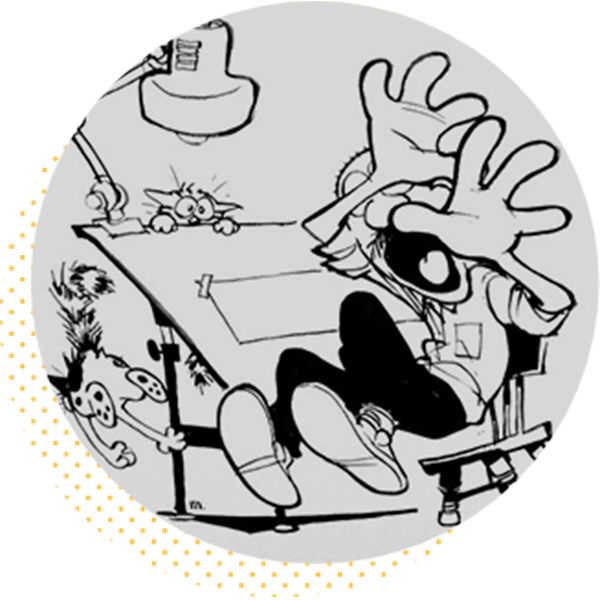 A cartoon character sitting at a drawing table, looking frustrated while covering their face with their hands. A lamp illuminates the workspace, and a small dog peeks out from the side, adding a humorous touch to the scene.