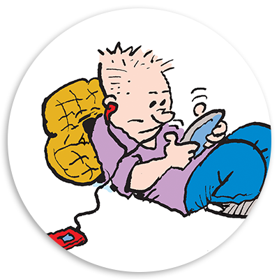 Boy sitting on the floor with a backpack, playing a handheld gaming device while wearing headphones, illustrating a casual gaming moment.