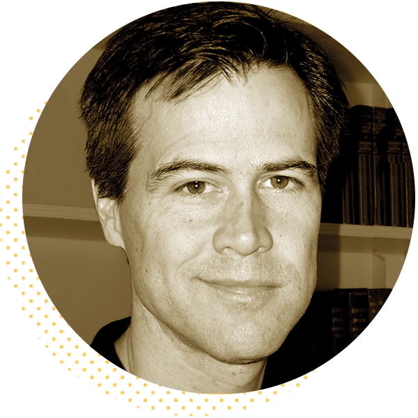 Portrait of a smiling man with dark hair, set against a circular background, showcasing a warm and approachable demeanor, suitable for professional or personal branding.